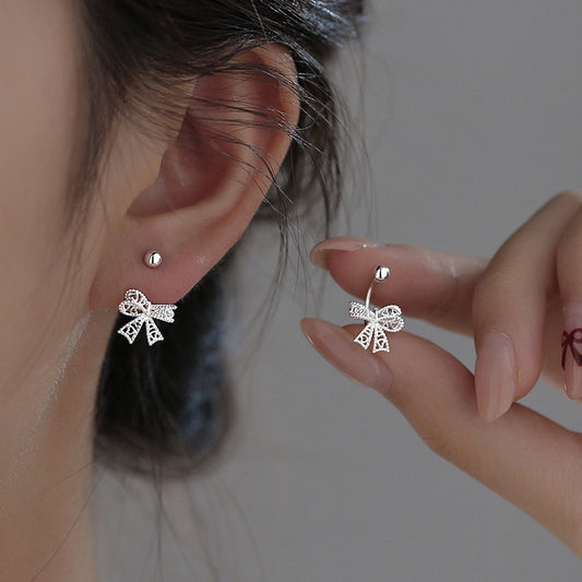 Hollow bow screw earrings