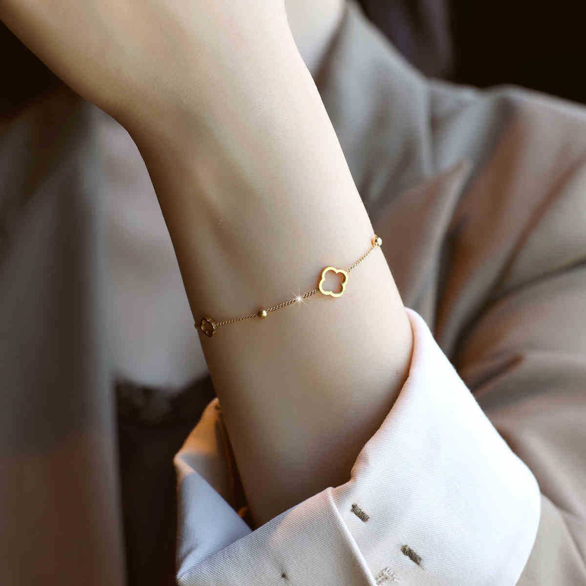 Hollow four-leaf clover titanium steel bracelet