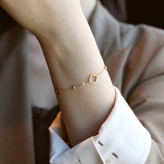 Hollow four-leaf clover titanium steel bracelet
