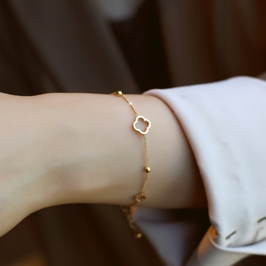 Hollow four-leaf clover titanium steel bracelet