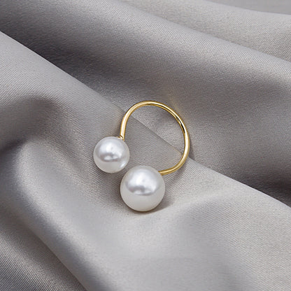 Large and small pearl open ring