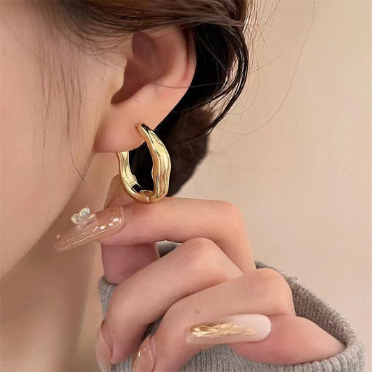 Irregular geometric earrings