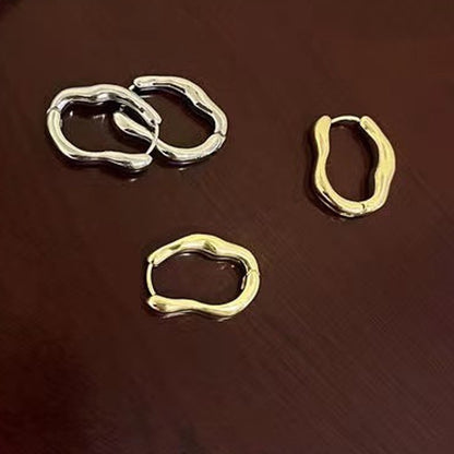 Irregular geometric earrings